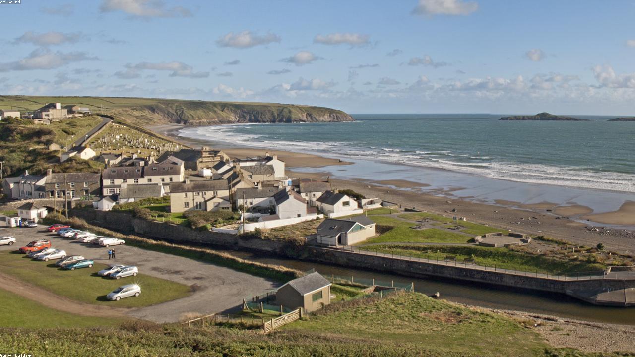 Aberdaron beach and village at the tip of the Llŷn Peninsula with Bardsey Sound beyond