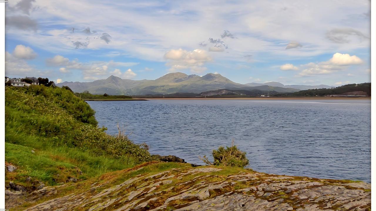 Wild swimmers in the Afon Glaslyn river pools in summer