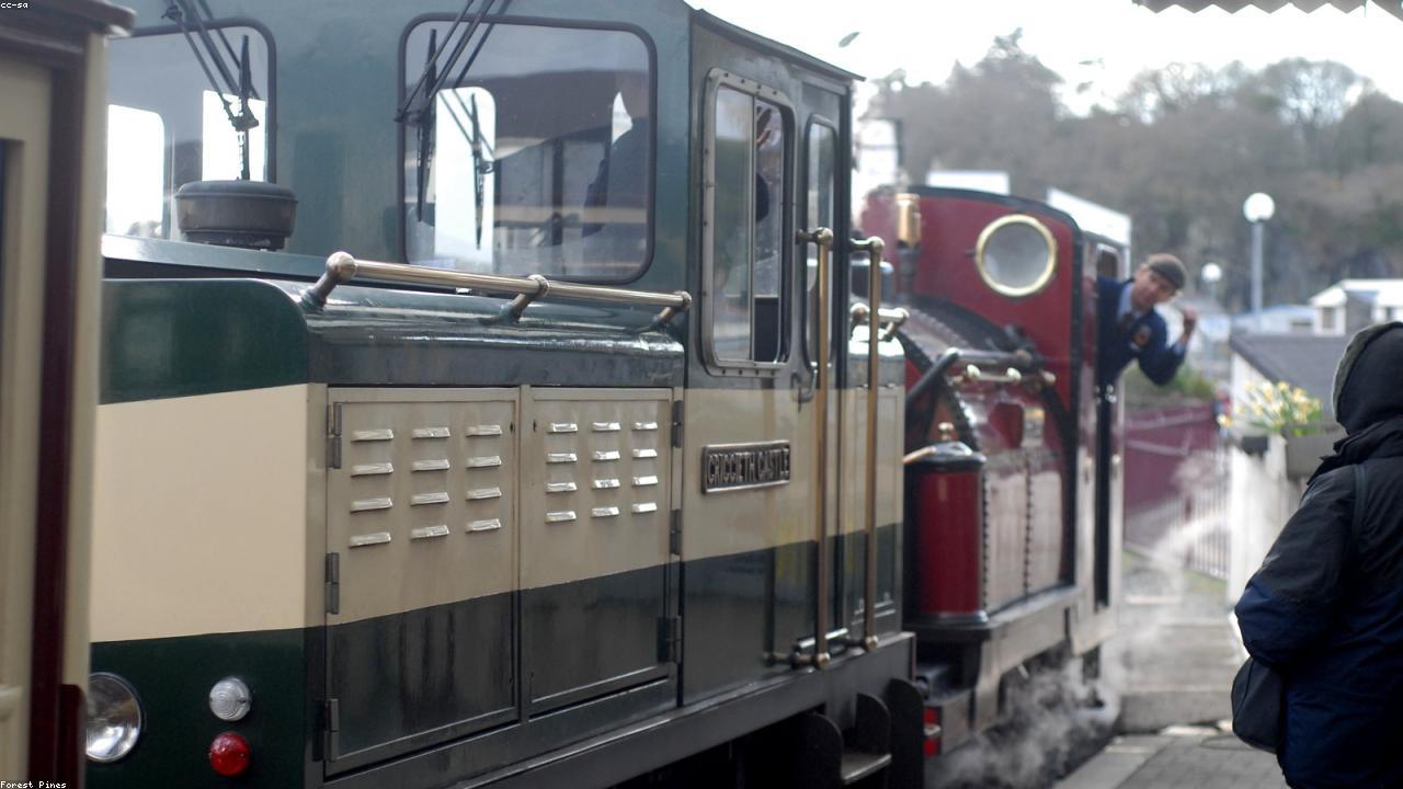 Ffestiniog Railway steam locomotive winding through Snowdonia mountain scenery