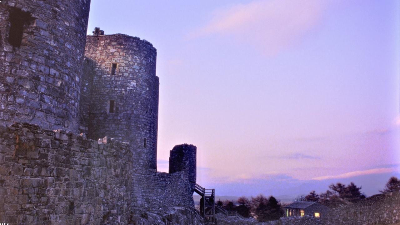 Harlech Castle rising dramatically from its 61-metre rock spur above Cardigan Bay